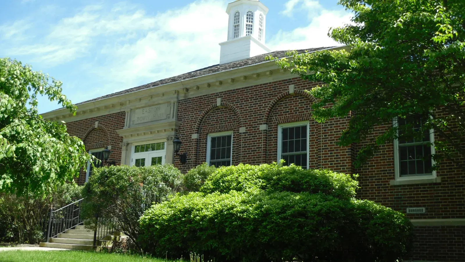 Easton Town Hall, a brick colonial civic building with a white cupola