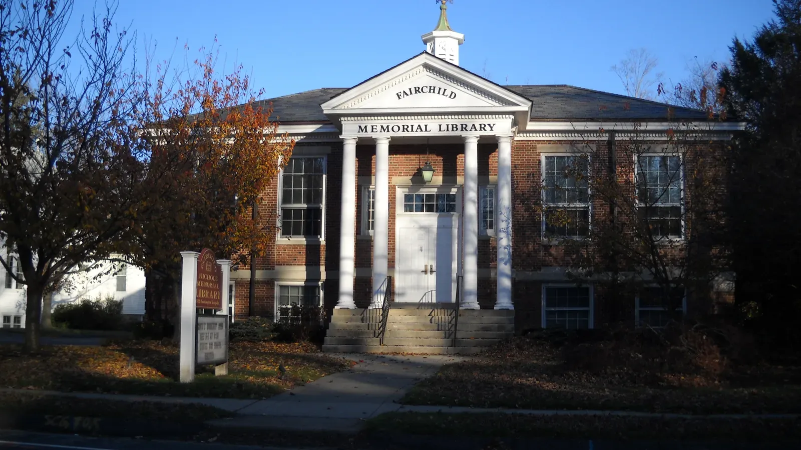 The Fairchild-Nichols Memorial Library, a columned brick building in the Nichols section of Trumbull
